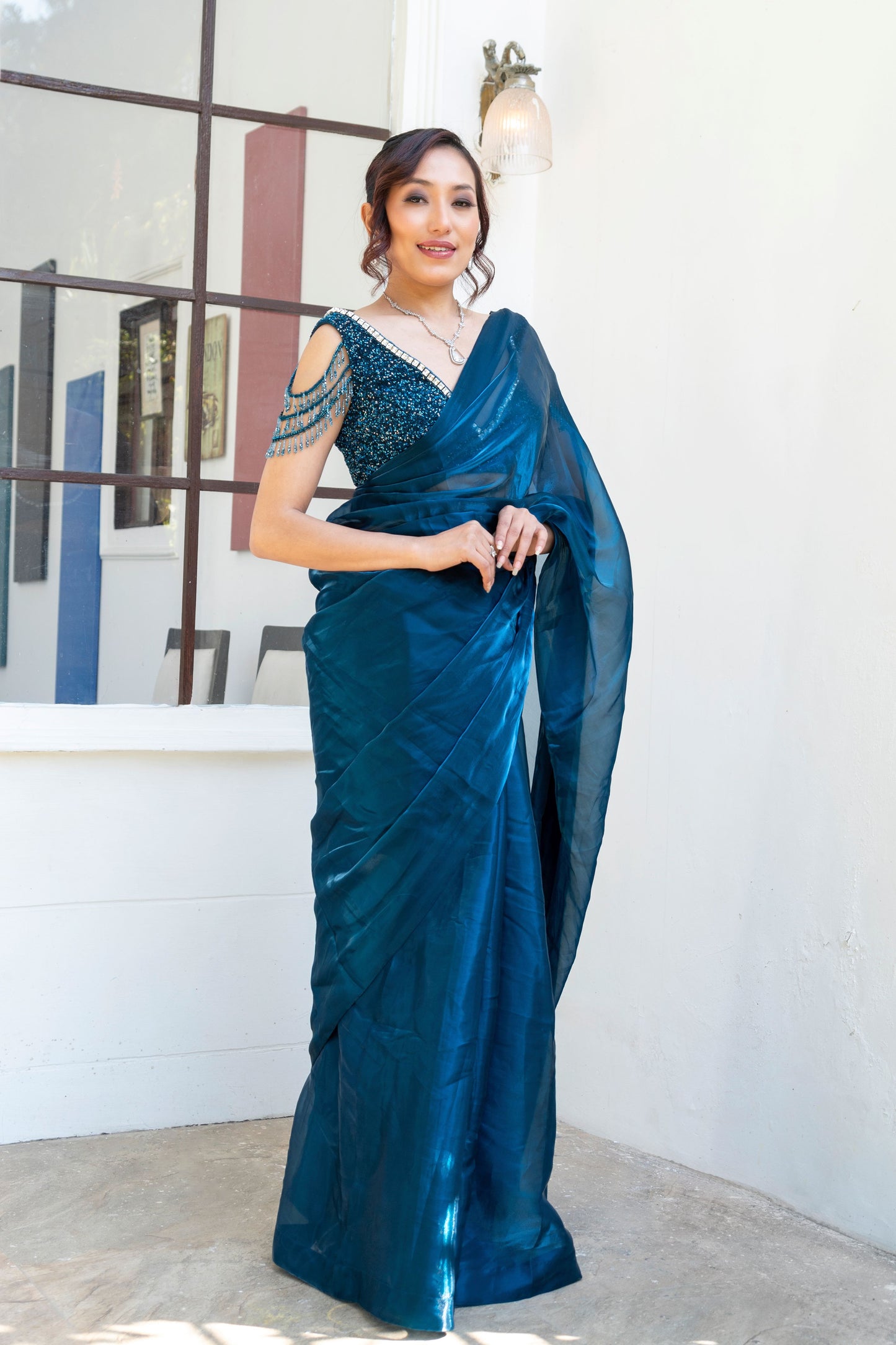 Teal embroidered Saree