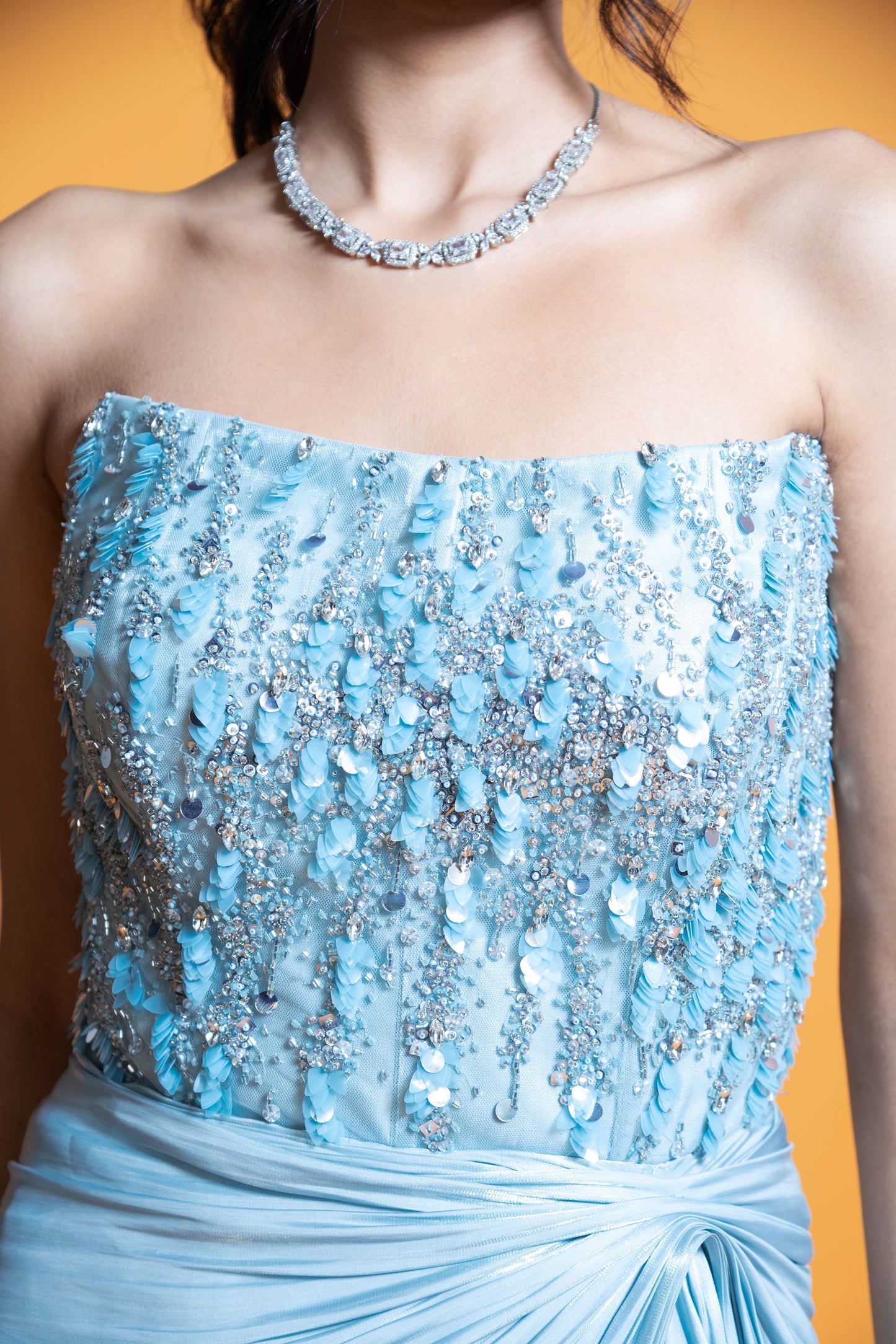 Sky blue embroidered draped evening gown