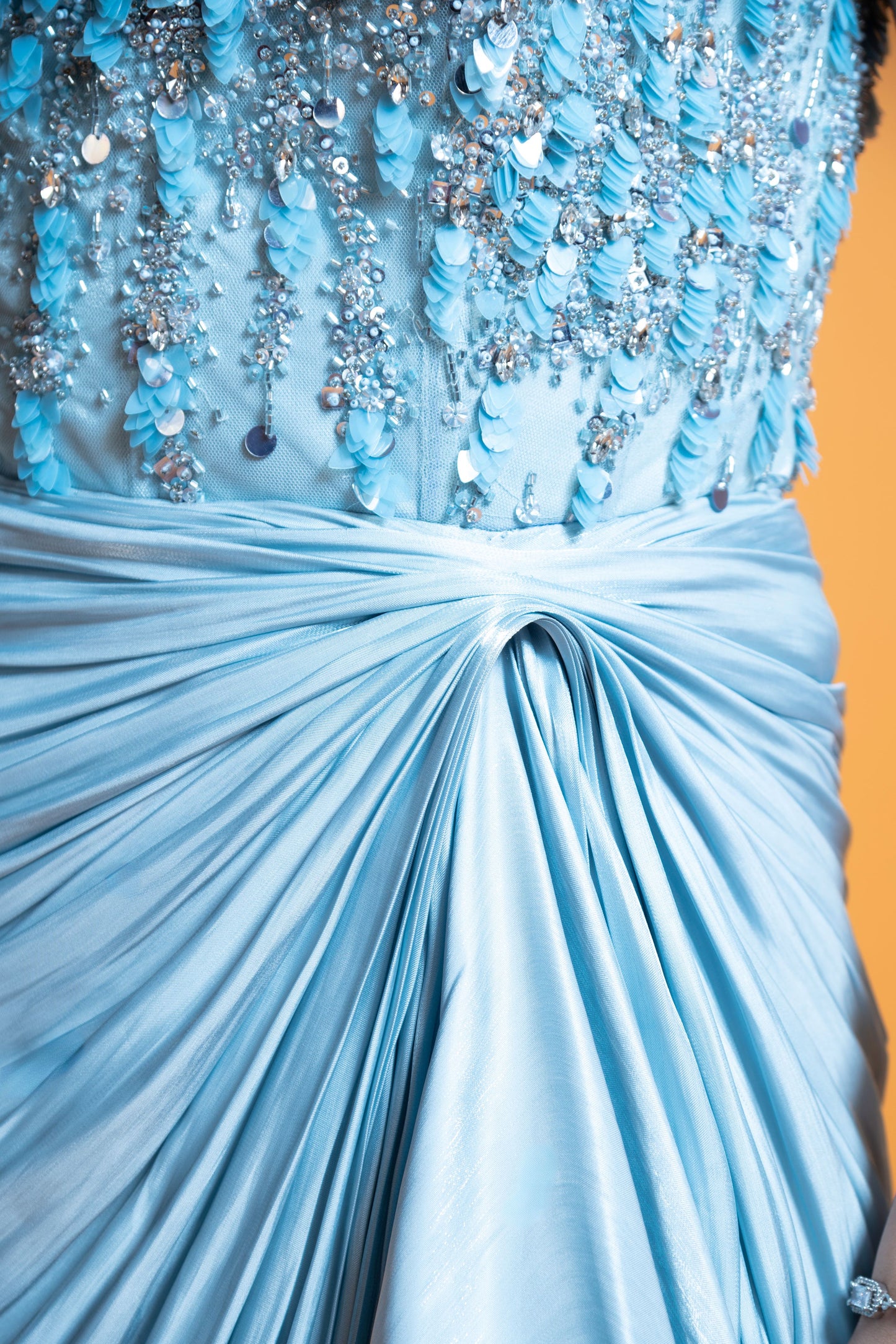Sky blue embroidered draped evening gown