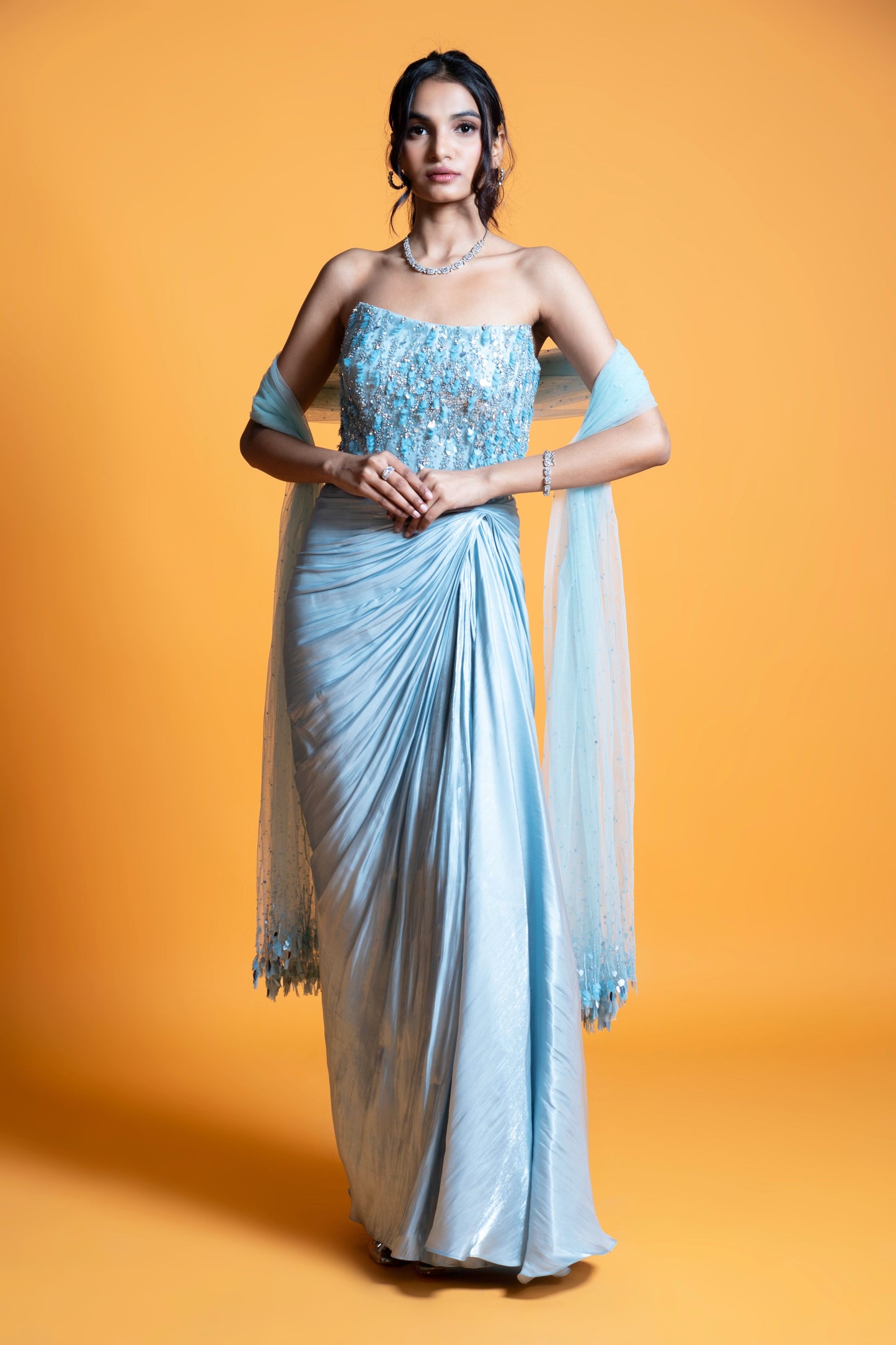Sky blue embroidered draped evening gown