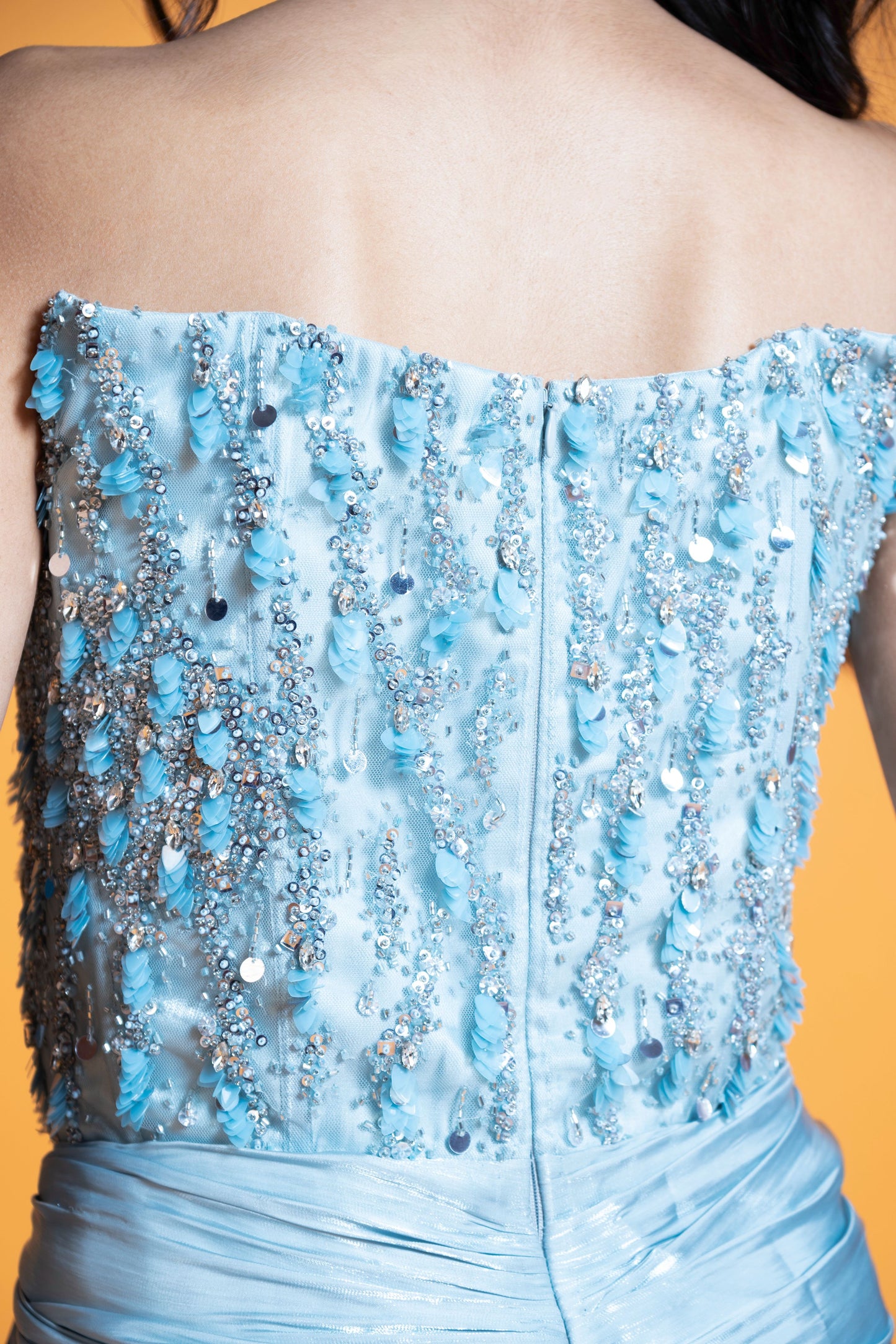 Sky blue embroidered draped evening gown