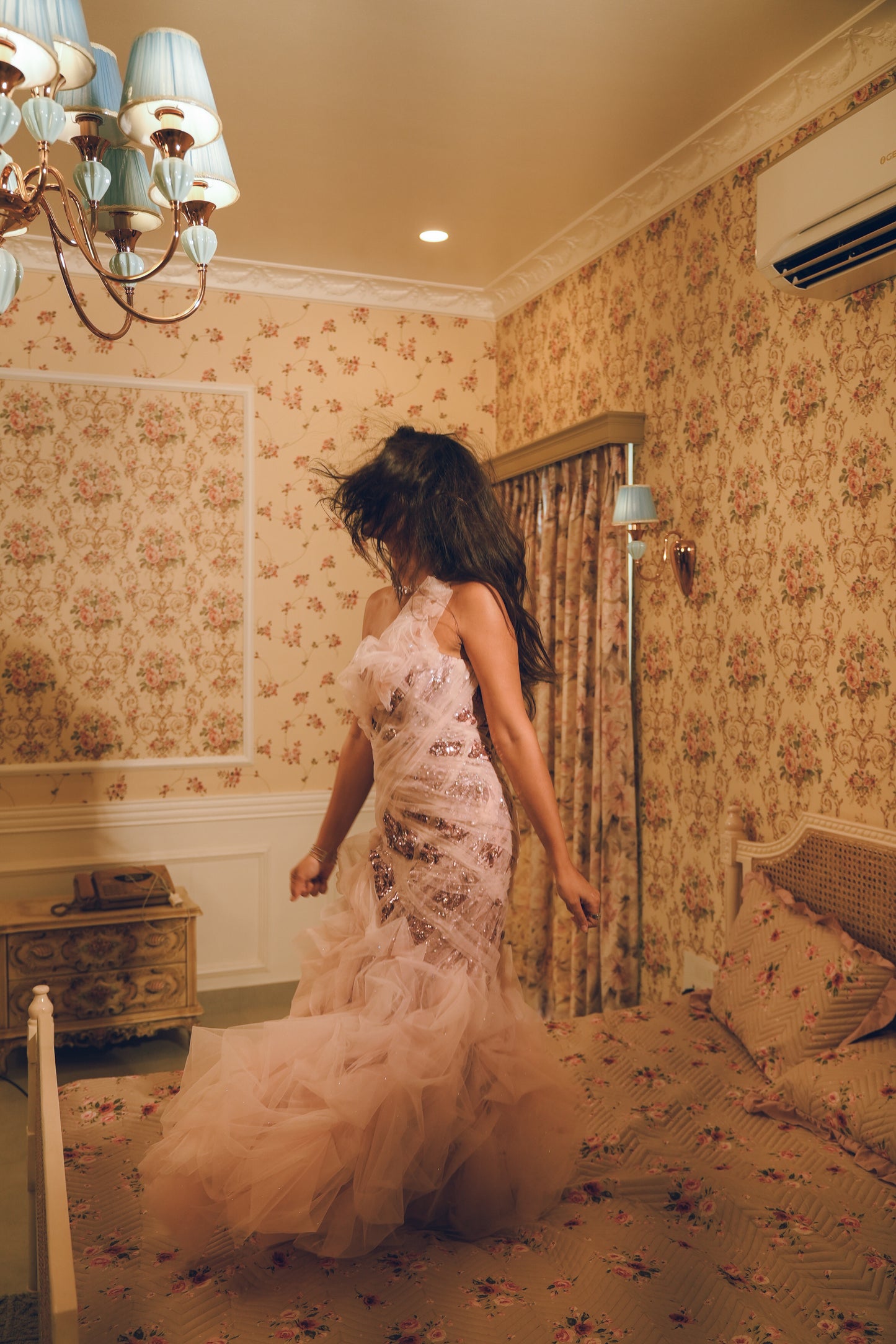 Pink draped stone embroidered evening gown