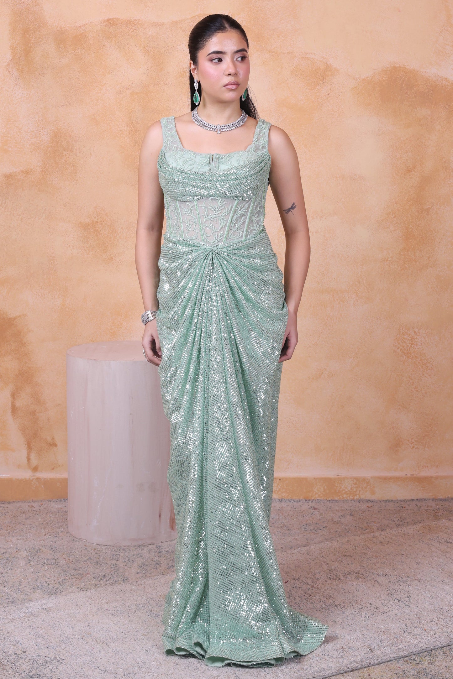 Pista green draped gown