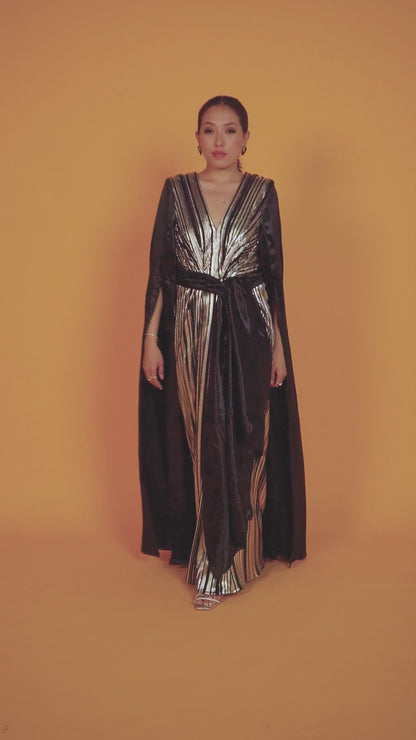 Black and gold long sleeve draped evening gown