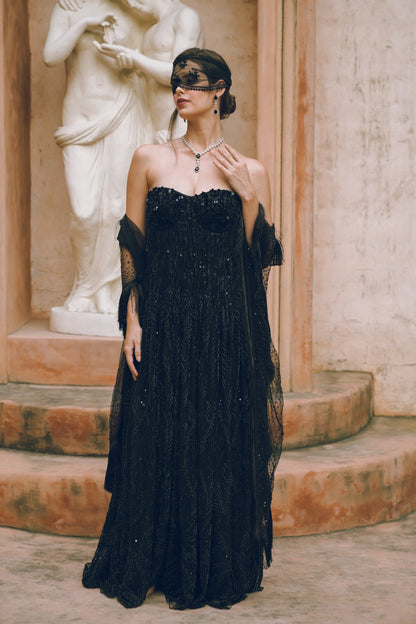 Black embroidered draped evening gown
