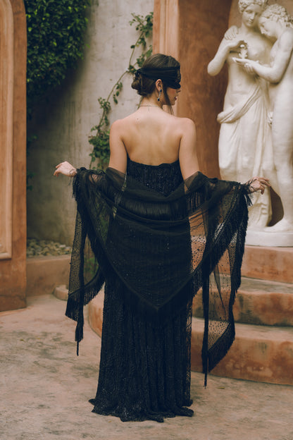 Black embroidered draped evening gown