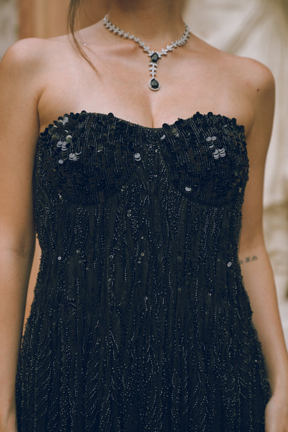 Black embroidered draped evening gown