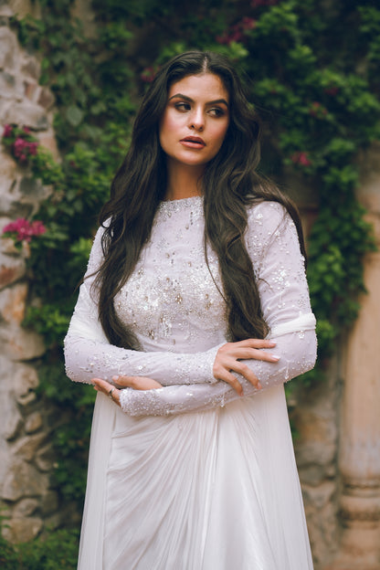 White embroidered draped evening gown