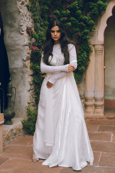 White embroidered draped evening gown